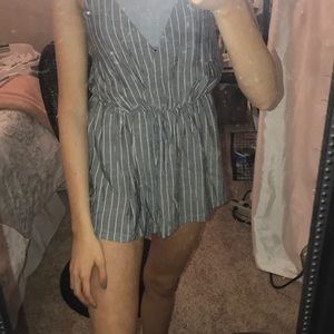 Grey and white vertical striped jumpsuit